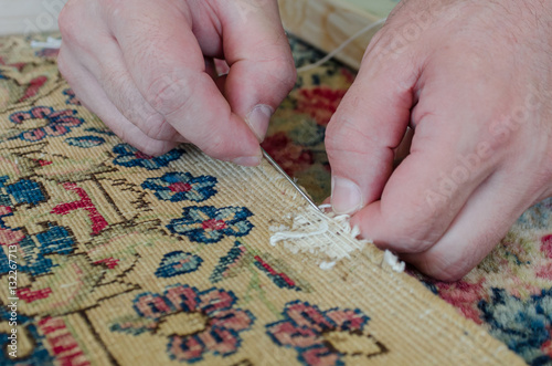 Restoring damaged old rug