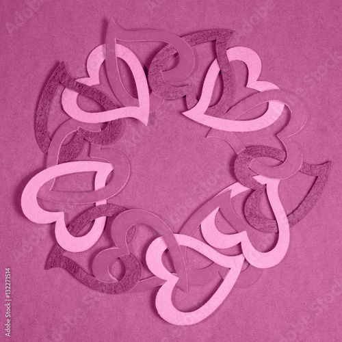 Circle of paper chain hearts, tinted romantic vintage pink photo