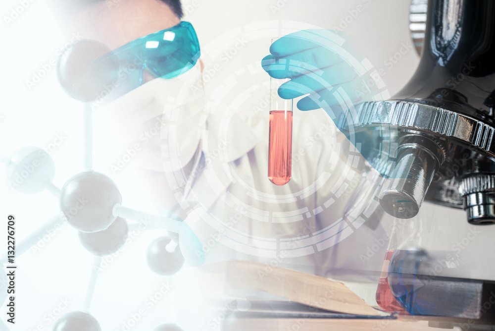 Double exposure of scientist,microscope and laboratory test tube Double exposure of scientist,microscope and laboratory test tube