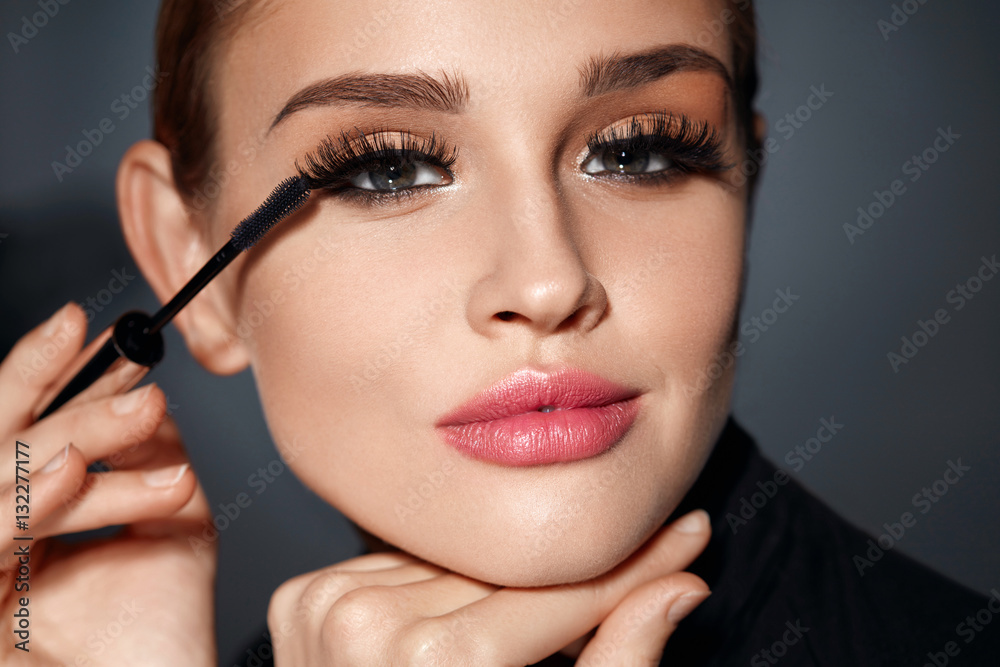Woman With Beauty Makeup, Long Black Eyelashes Applying Mascara