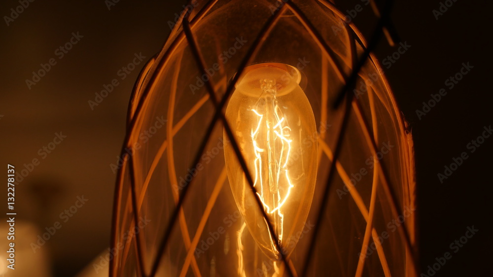 Вольфрамовая нить на старинной лампе накаливания Stock Photo | Adobe Stock