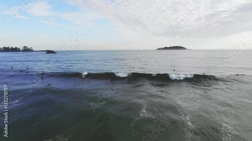 Surfer catching a wave
