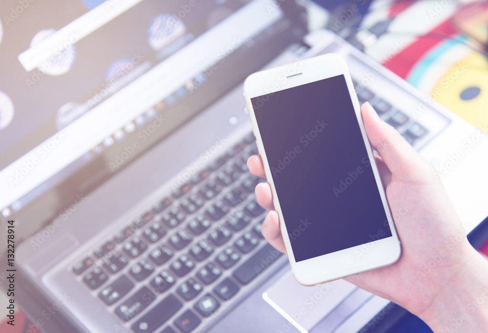 hand holding using mobile phone.girl using smart phone.