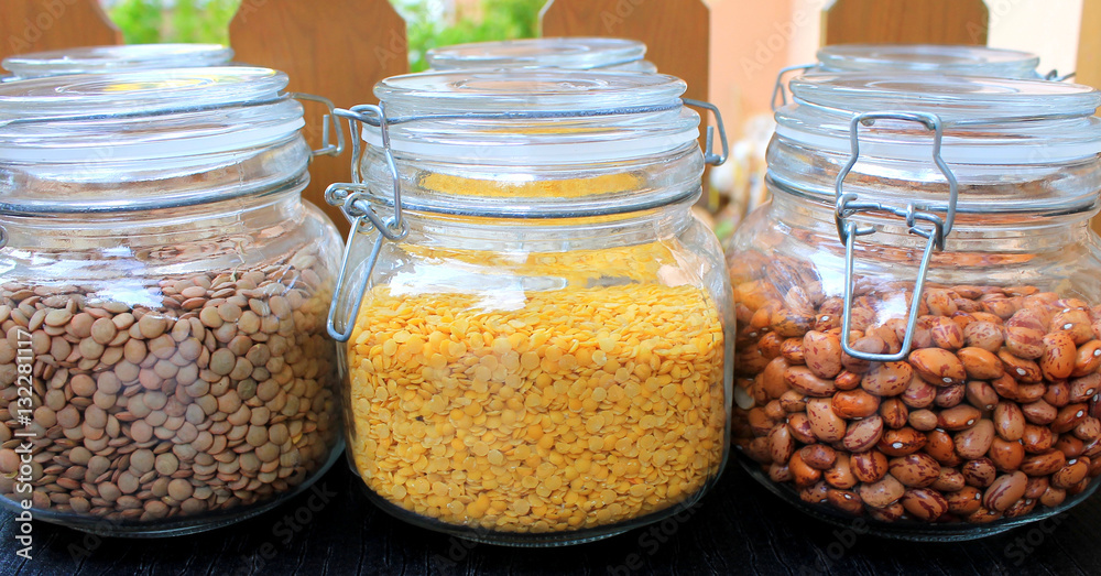 Bean grains in glass jars in the kitchen Bean grains in glass jars in the kitchen