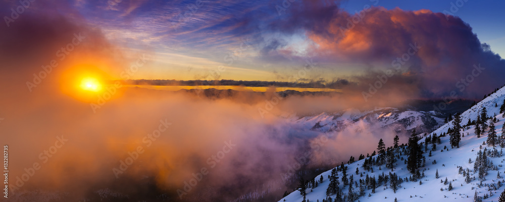 Fototapeta premium Sunrise in winter on Slide Mountain near Reno, NV on the Mt. Rose Highway. Colorful clouds and snowy landscape.