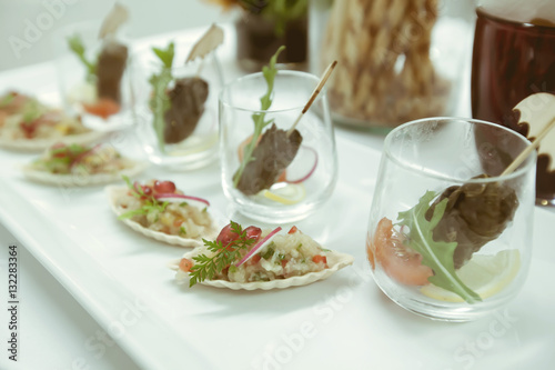 Food on white plate on the table for service in luxury dinner pa