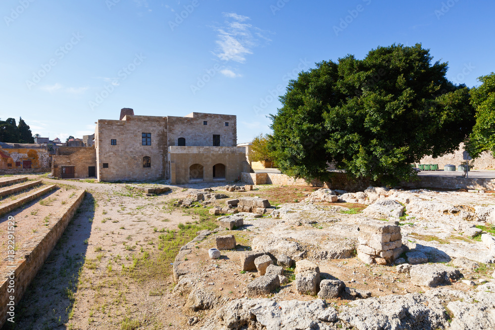 Ruins of ancient city wall in the historic town of Rhodes.