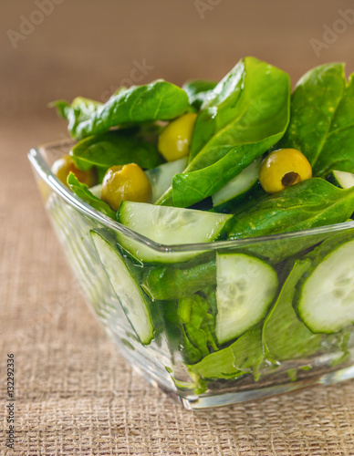 salad of spinach leaves with cucumber