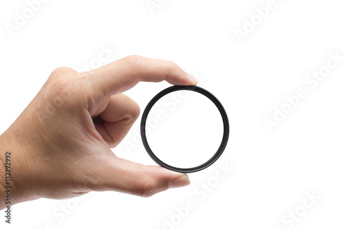 hand hold clear camera filter circle ring isolated on white with clipping path