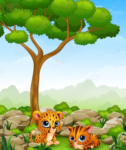 Fototapeta Naklejka Na Ścianę i Meble -  Cartoon baby cheetah with kitten lay down in the jungle