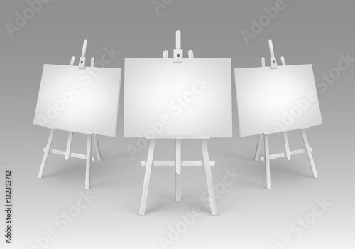 Vector Set of White Wooden Easels with Mock Up Empty Blank Canvases on Background