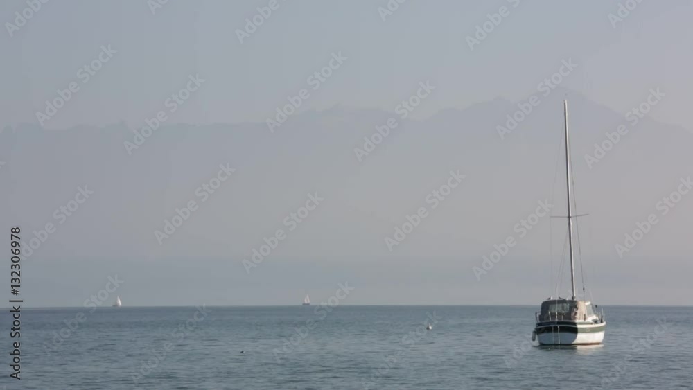 Yacht on a lake Geneva, Switzerland, Europe Yacht on a lake Geneva, Switzerland, Europe