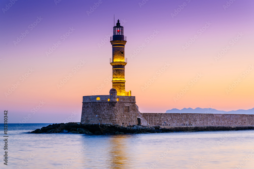 Venetian lighthouse in Chania at purple sunrise, Crete, Greece
