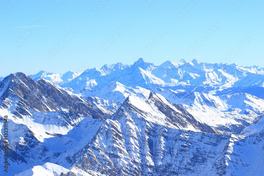 Alpine peaks covered with snow. Aosta valley region in Italy.
