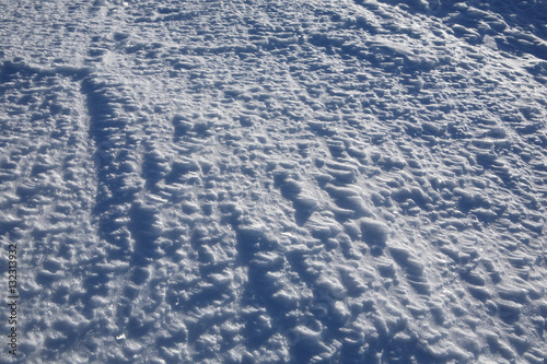 The natural texture of the snow  covered with crystals of frost