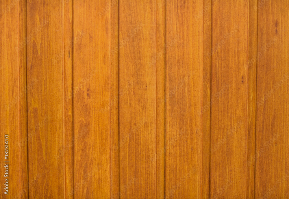 Natural wooden orange background, rough texture of hardwood planks for floors and walls in the construction of the house Natural wooden orange background, rough texture of hardwood planks for floors and walls in the construction of the house
