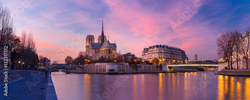 Picturesque grandiose sunset over Cathedral of Notre Dame de Paris, France. Panorama © Kavalenkava