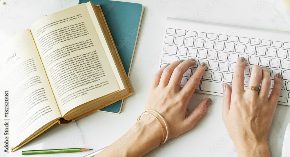 Obraz premium Book Computer Connecting Digital Research Concept