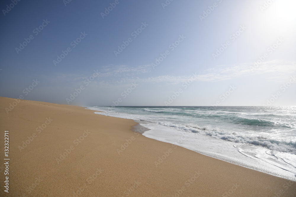 Fototapeta premium Calm waves, Praia da costa de Santo André, Portugal