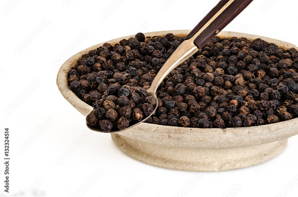 Black Pepper on Old Spoon and Stone Bowl Black Pepper on Old Spoon and Stone Bowl