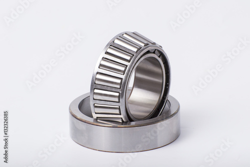 Two roller-bearing open and closed on a white background