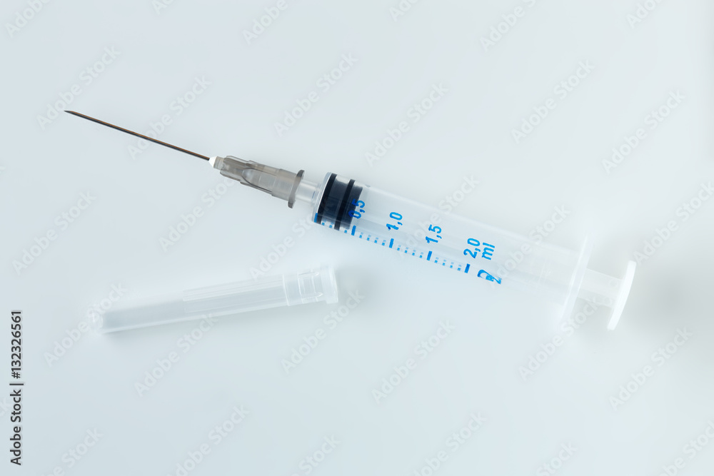 Disposable syringe isolated on white background. Disposable syringe isolated on white background.
