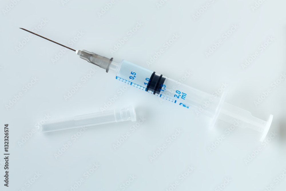 Disposable syringe isolated on white background. Disposable syringe isolated on white background.