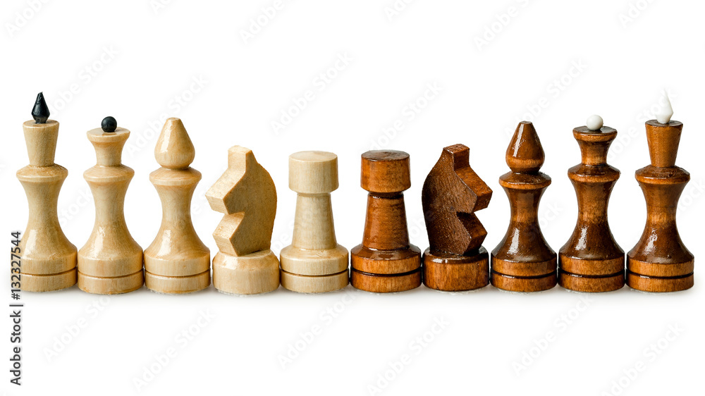 Chess pieces in a row isolated on a white background Chess pieces in a row isolated on a white background
