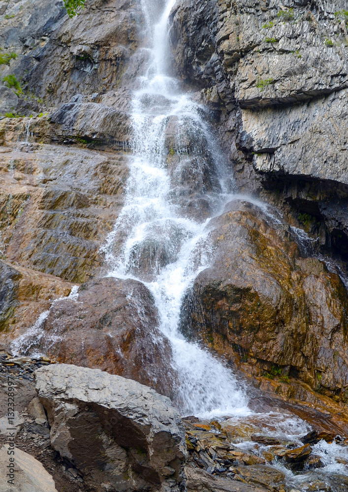 Naklejka premium Beautiful, mountain waterfall.