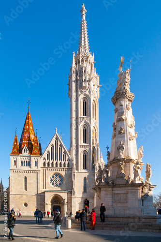 Photography Roman Catholic Matthias Church and Holy Trinity plague column at Fisherman's Bastion in Buda Castle District, Budapest, Hungary, Europe
