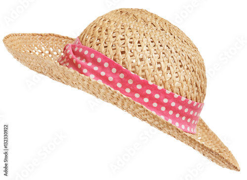 Open weave straw hat with pink polka dot band and curved brim photo