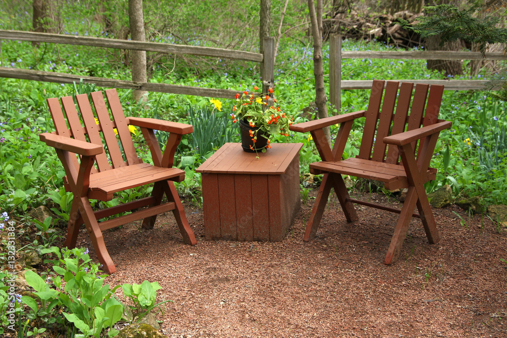 Natural landscaped back yard with outdoor furniture