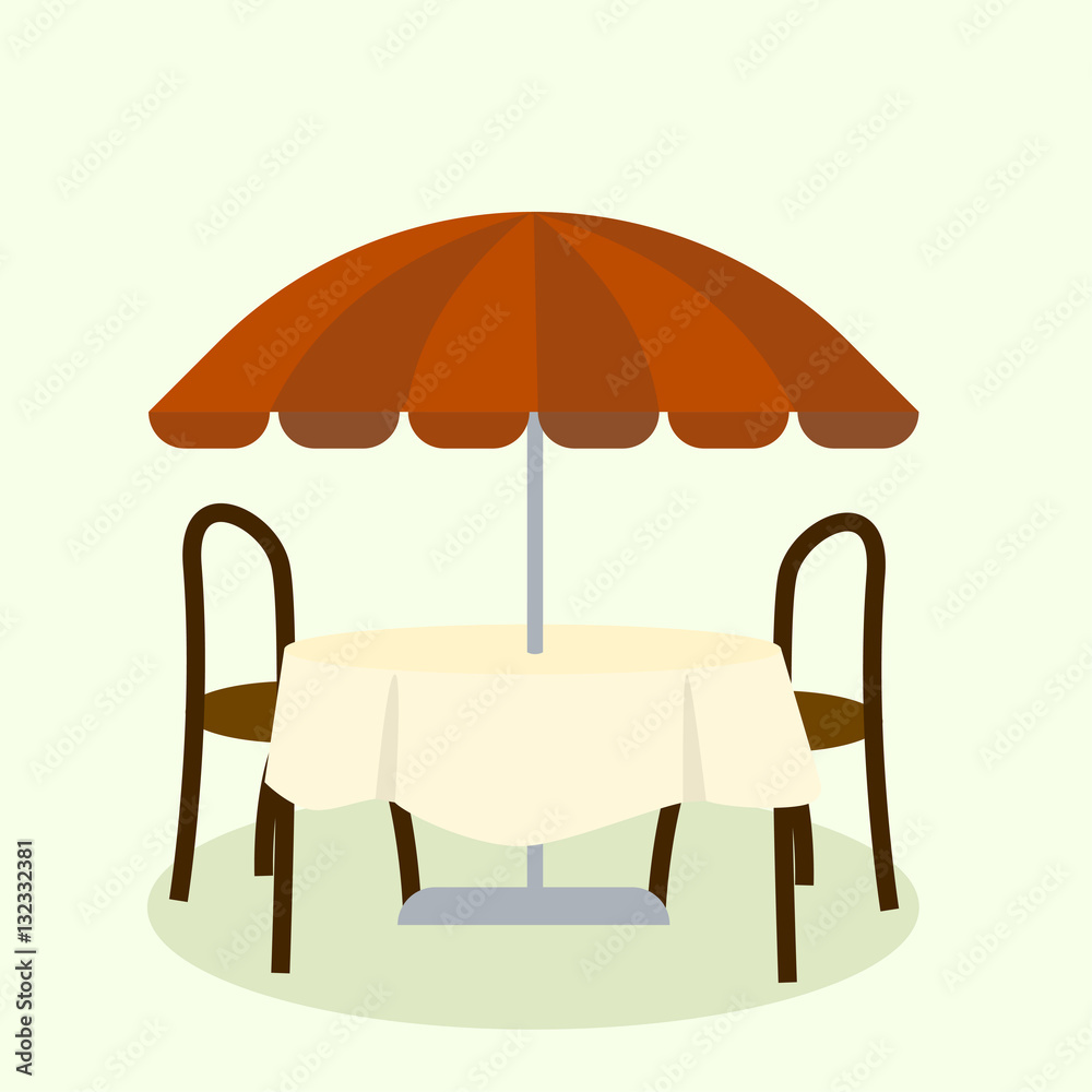 Cafe table and chairs under an sunshade.