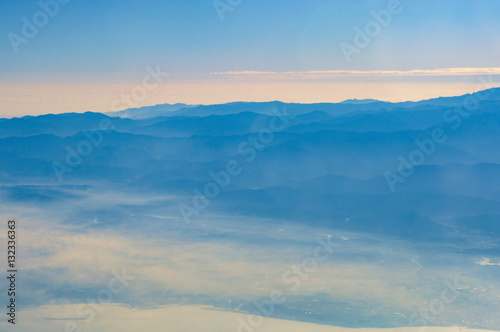 Layers of mountain from airplane top view