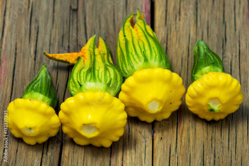 Raw Organic Yellow Pattypan Squash Ready for Cooking photo