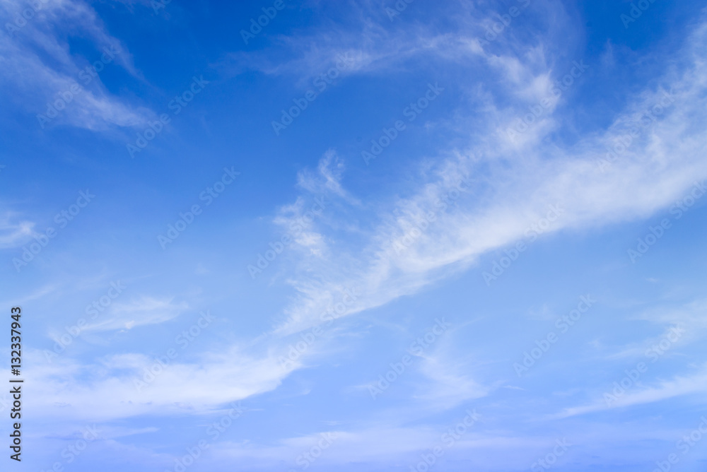 Blue sky with closeup white fluffy tiny clouds background and pa