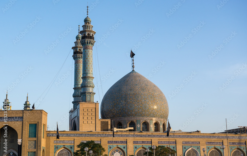 Minarets and dome of Fatima Masumeh Shrine in Qom city in Iran