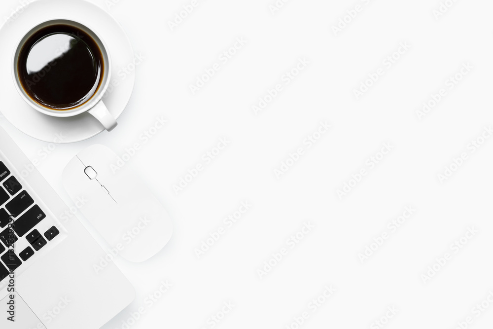 White office desk table with laptop, mouse and coffee. Top view with copy space, flat lay. White office desk table with laptop, mouse and coffee. Top view with copy space, flat lay.