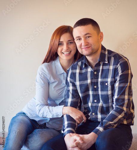 Portrait of lovely happy couple at home