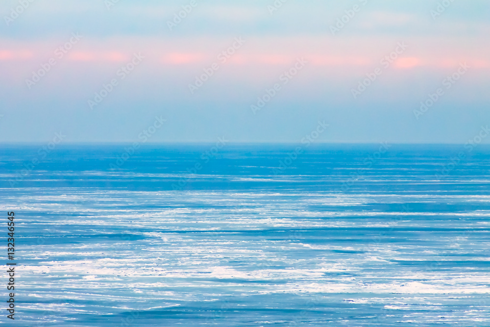Naklejka premium frozen sea at sunrise, sunset north, nature background