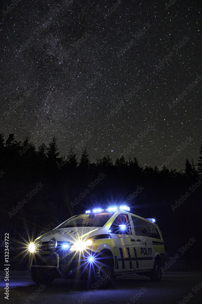 Police car and the milky way