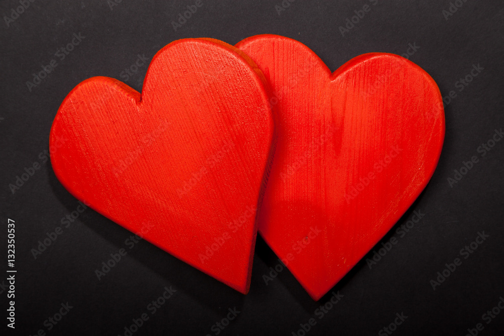 Holidays gift and heart on a black background. Valentines day Holidays gift and heart on a black background. Valentines day