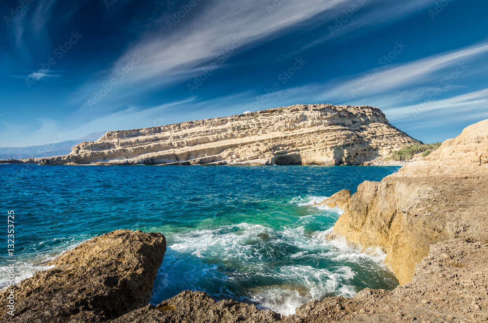 Matala beach on Crete island, Greece. View from the rocks. There are many caves near the beach. Matala beach on Crete island, Greece. View from the rocks. There are many caves near the beach.