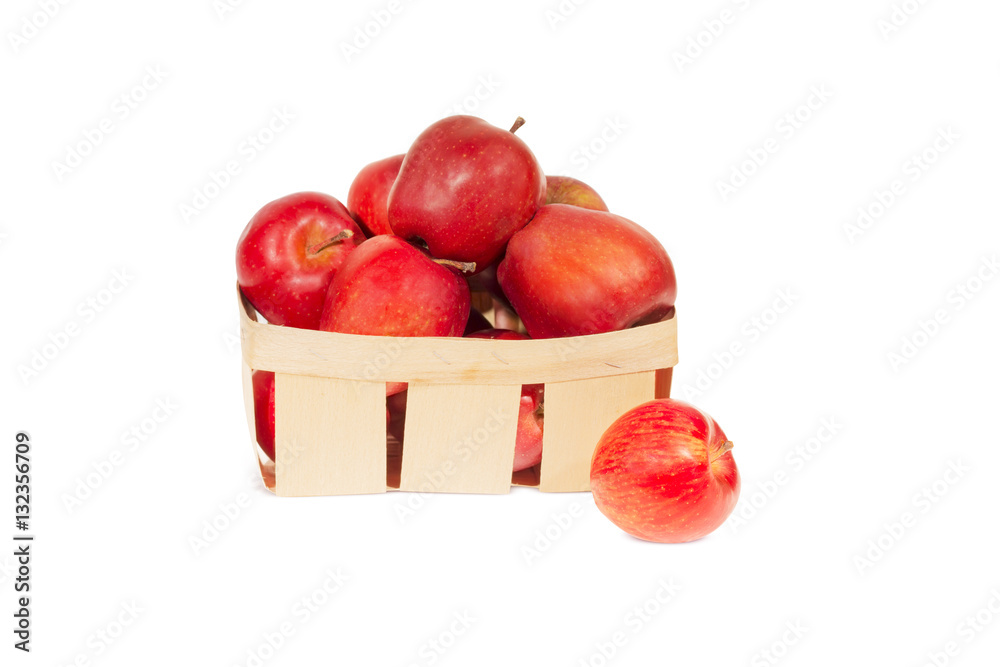 Fresh red apples in wooden basket isolated, autumn harvest Fresh red apples in wooden basket isolated, autumn harvest