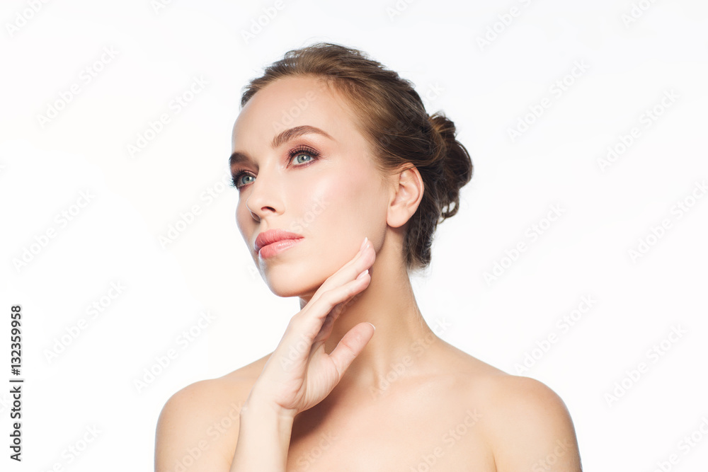 beautiful young woman touching her face beautiful young woman touching her face