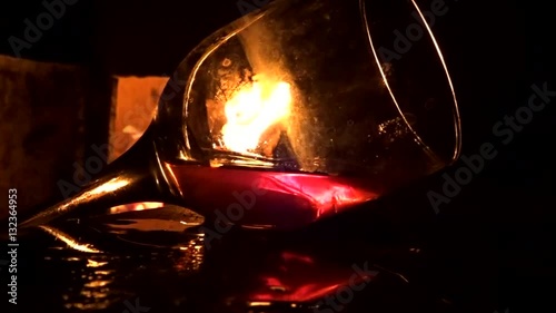 glass of cognac and flame photo