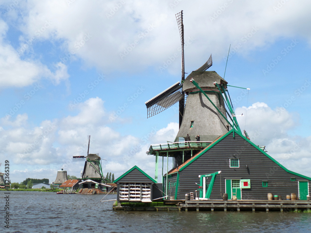 Stunning view of traditional Dutch windmills in Zaanse Schans, Netherlands 