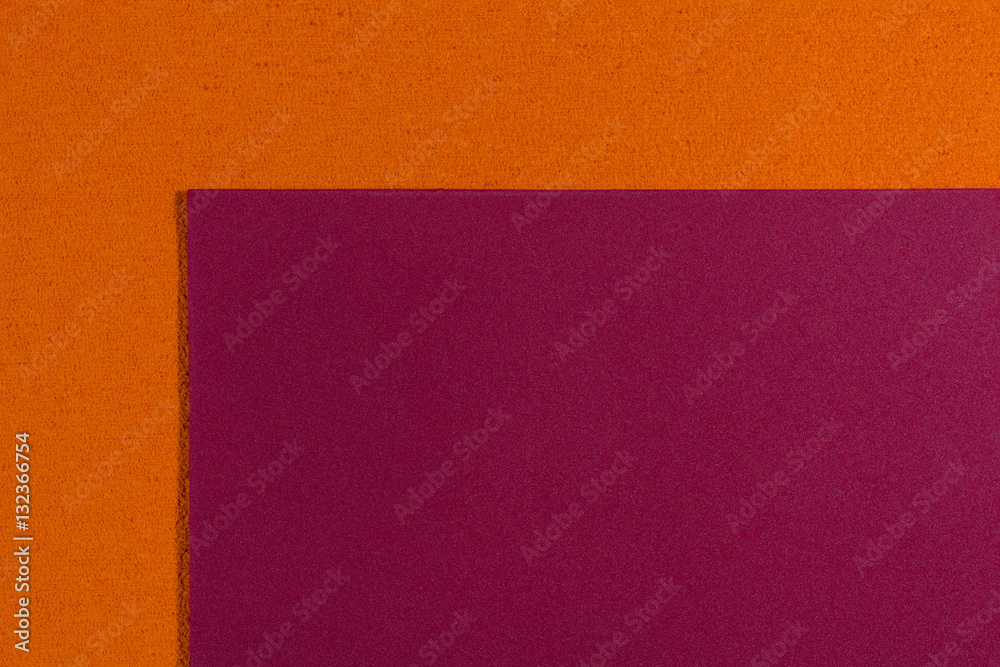 Eva foam ethylene vinyl acetate smooth red surface on orange sponge plush background Eva foam ethylene vinyl acetate smooth red surface on orange sponge plush background