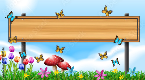 Wooden sign template with butterflies in garden