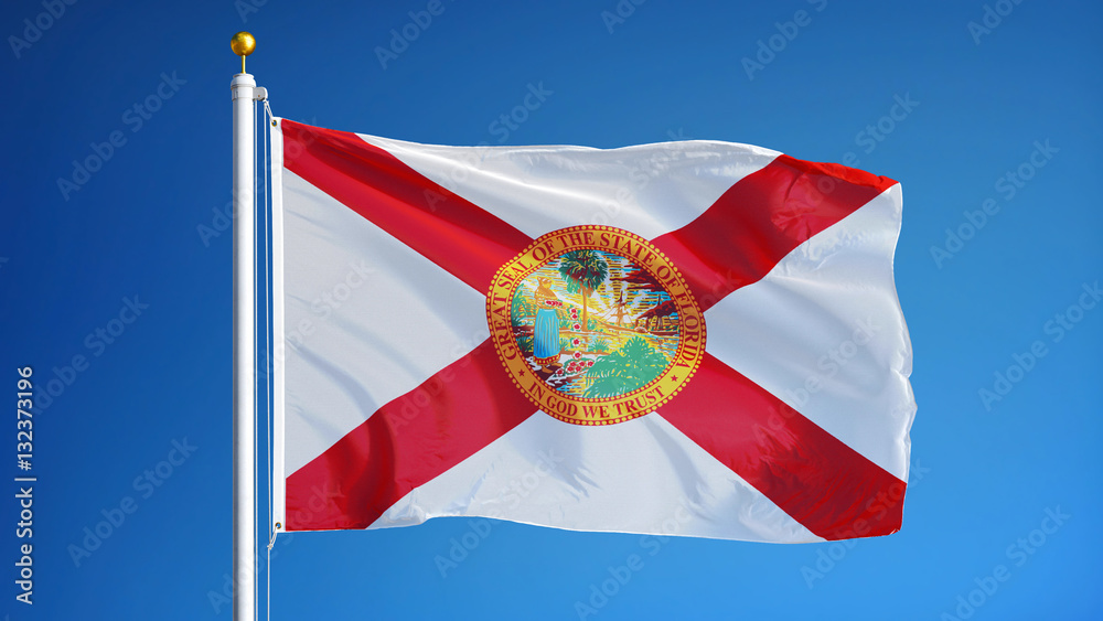 Obraz premium Florida (U.S. state) flag waving against clear blue sky, close up, isolated with clipping path mask alpha channel transparency, perfect for film, news, composition